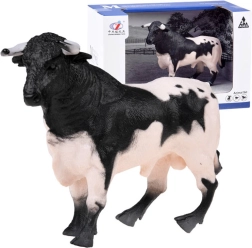 Black-and-white farm bull figurine