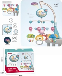 Plavi vrteški iznad krevetića sa životinjicama