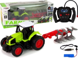 RC traktor 1:16 s gumenim kotačima i odvojivim plugom
