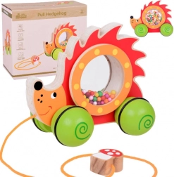 Drveni vučni ježić s šarenim kuglicama