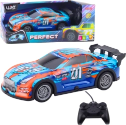 RC trkaći auto sa svjetlećom karoserijom, narančasto–tirkizni