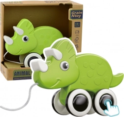 Zeleni dinosaur na povlačenje s pištaljkom