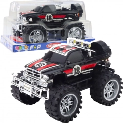 Terensko vozilo sa stražnjim pogonom, veliki kotači, crveno‑crno