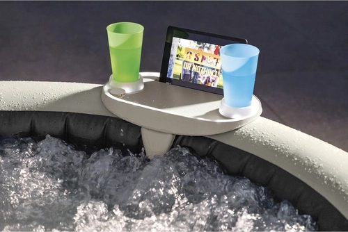 Two drink holders and space for a device
