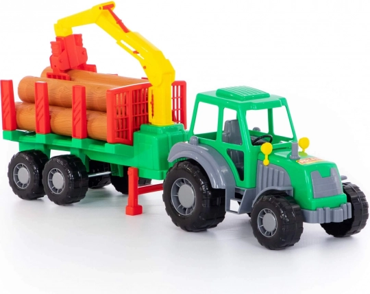 Šumski traktor Altaj s utovarivačem i prikolicom