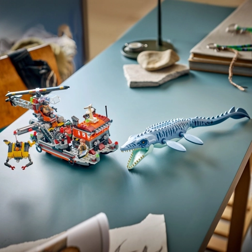 Boat with crane and tilting platform for action play