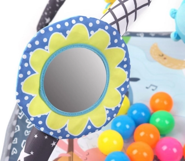 Sensory play: hanging toys, rattle and mirror