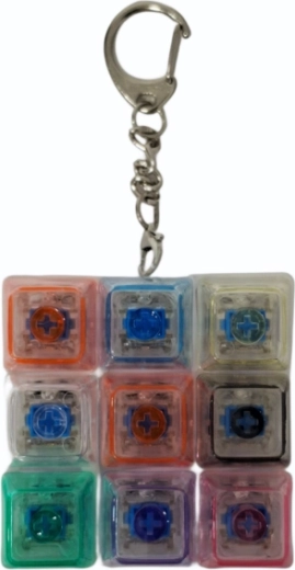Anti-stress keychain with mechanical button and LED backlight