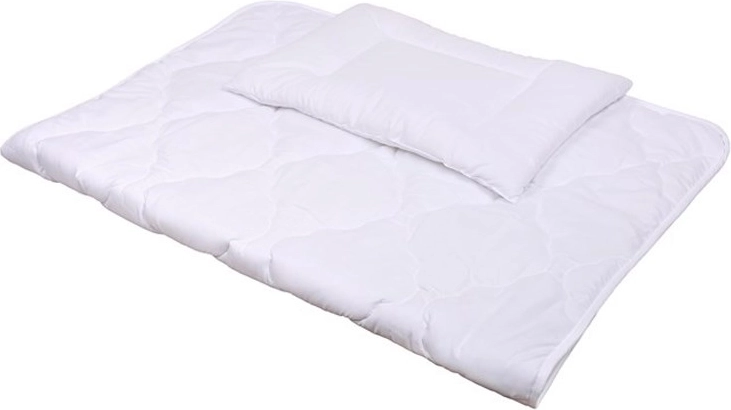 Udobna poplun-deka i jastuk s prošivima