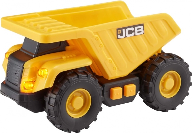 Tilting dump bed for construction-site play
