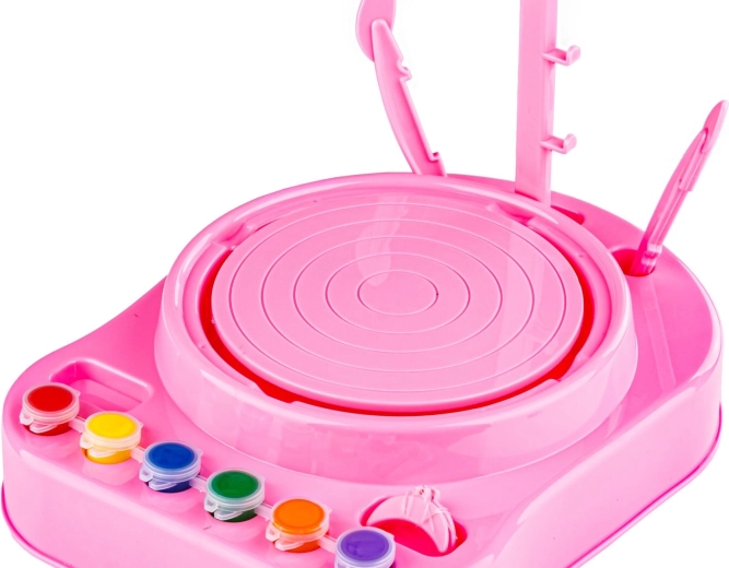 Pink pottery wheel with rotating platform