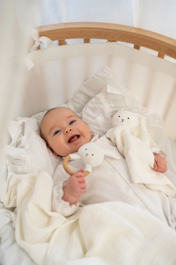 Wooden fabric rattle for little hands
