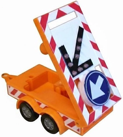 Trailer with warning sign and flashing light