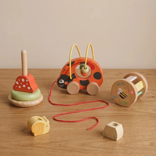 Threading stacker with a snail and mushroom