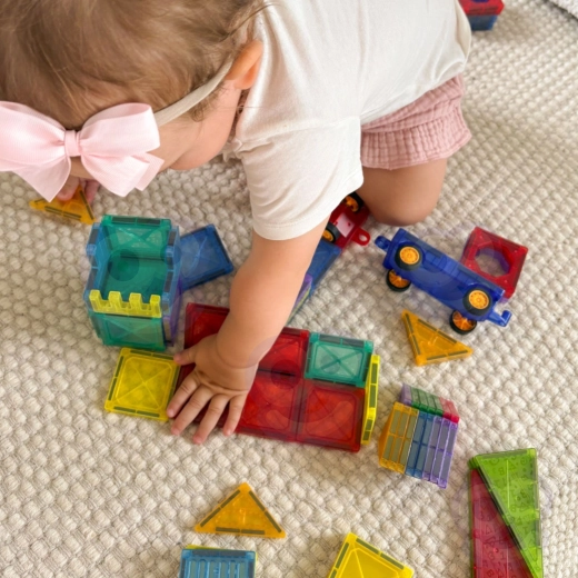 A castle and vehicles made from colorful pieces