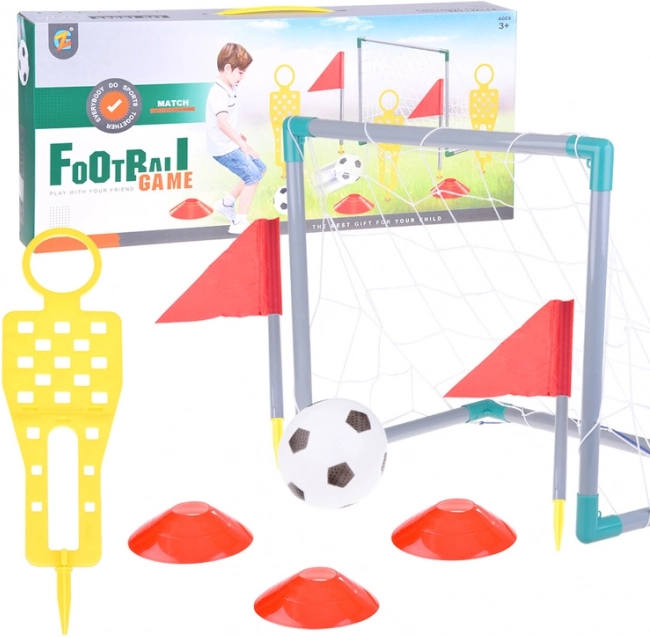 Dječji nogometni gol s loptom i čunjevima