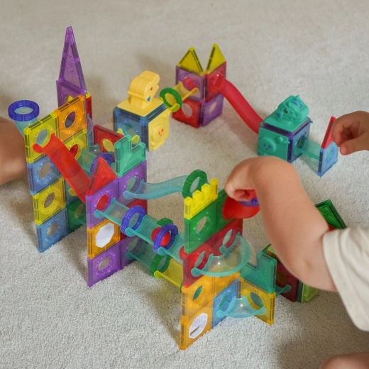 Transparent magnetic pieces and a modular system