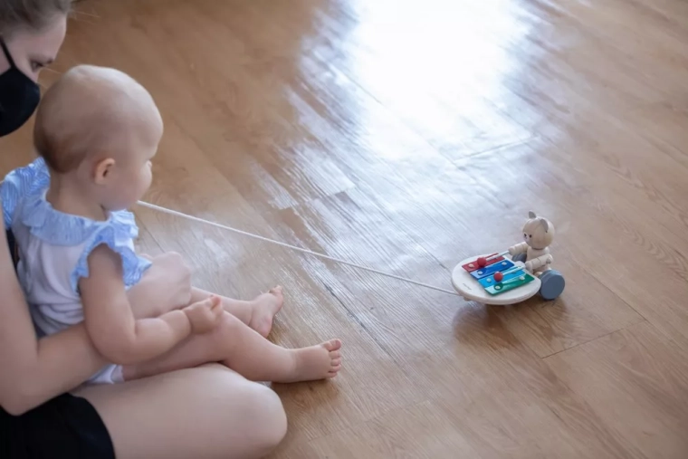 Encourages walking and develops motor skills
