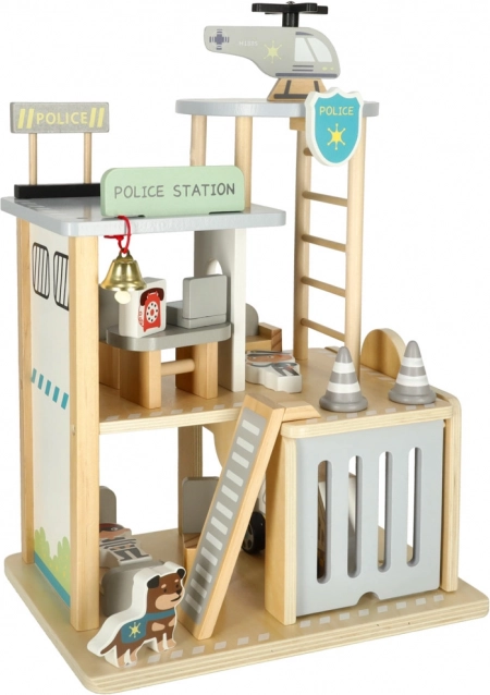 Drvena policijska postaja s garažom, automobilom i helikopterom