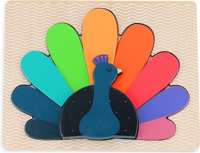 Drvene umetaljke puzzle Paun od Vilac