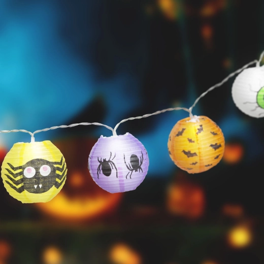 Halloween string lights with pumpkin lanterns