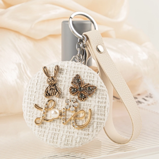 Pocket mirror Bunny in a Nest made of Natural Tweed with a Pearl