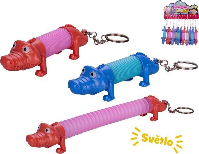 Natezani privjesak za ključeve krokodil sa svjetlom