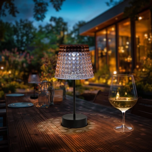 Damaged pink solar table lamp with cool white LED