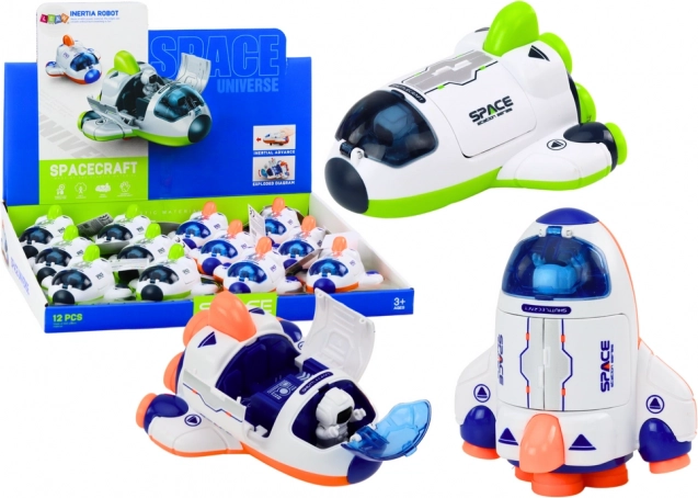 Mala svemirska raketa s pomičnom pilotskom kabinom zelene i narančaste boje