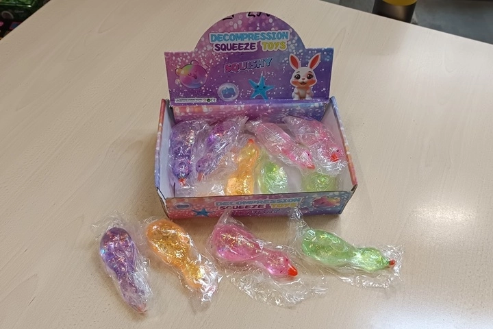 Squeezable anti-stress duck with glitter - 1 piece