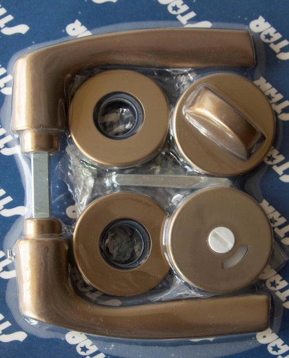 Vratárna oprema MONET na rozeti, WC, brončano eloksirana