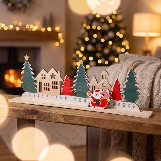 Advent calendar with a Christmas village and St. Nicholas