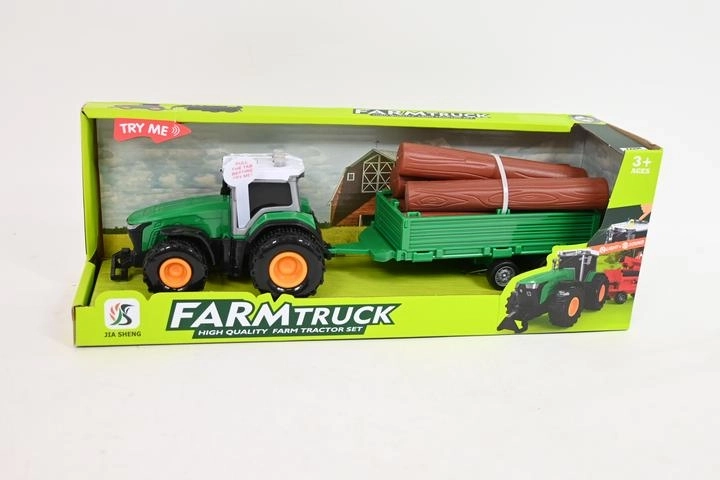 Traktor s prikolicom i kladama