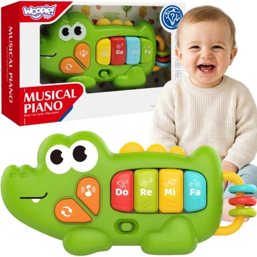 Woopie Baby interaktivni piano krokodil sa zvukovima i svjetlom 18m+