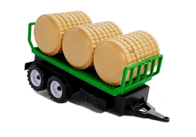 Traktor s prikolicom za bale sijena Cisterna