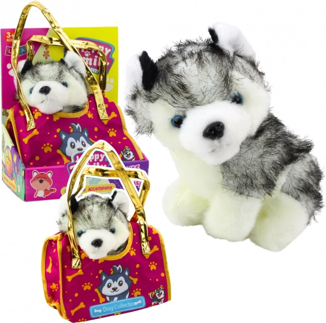 Plišani pas Husky u torbi