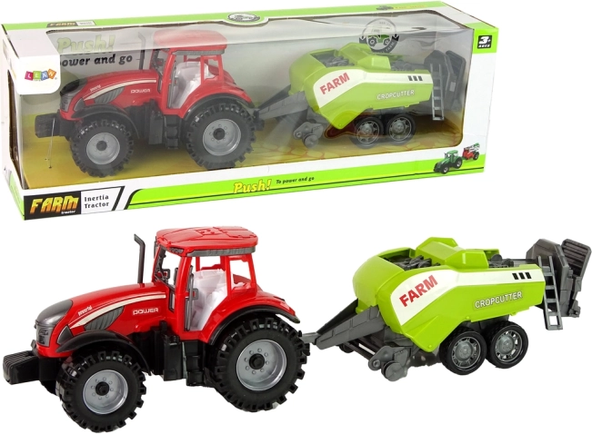 Crveni traktor sa zelenom sijačicom s trenjnim pogonom