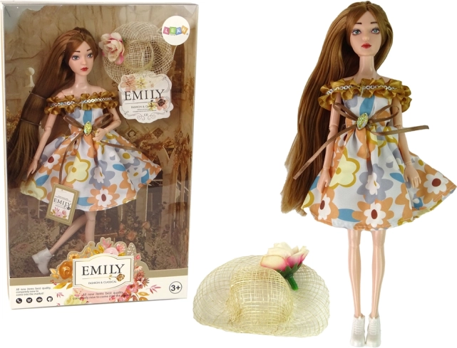 Lutka Emily s jesenskim šeširom i dugom smeđom kosom