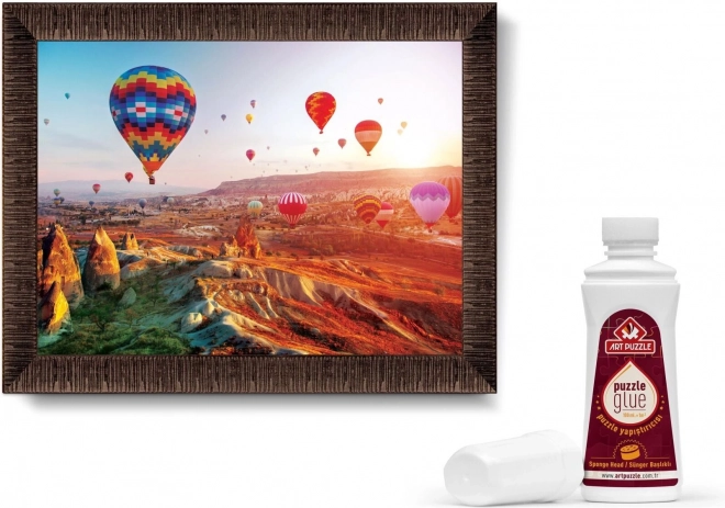 ART PUZZLE Slagalica s okvirom i ljepilom 3v1 1000 dijelova – Baloni iznad Kapadokije