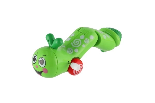 Namotani crvić koji puže, plastika 13cm, 6 boja, 12 komada u kutiji