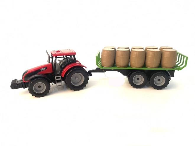 Traktor sa zamajcem i prikolicom punom sijena