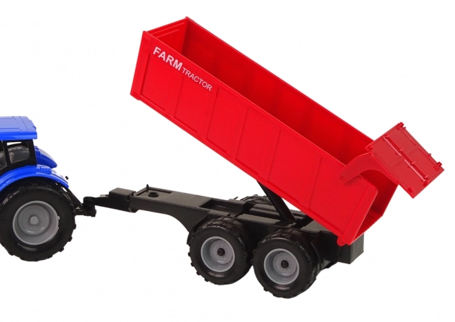 Interaktivni traktor s prikolicom - plavi