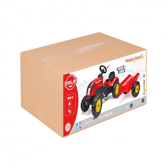 Pedalni traktor s prikolicom crveni