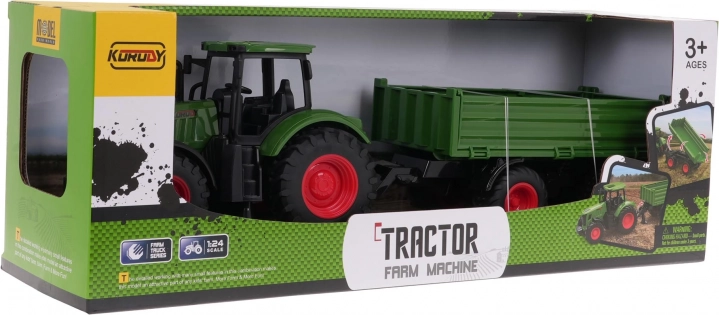 Zeleni traktor s prikolicom