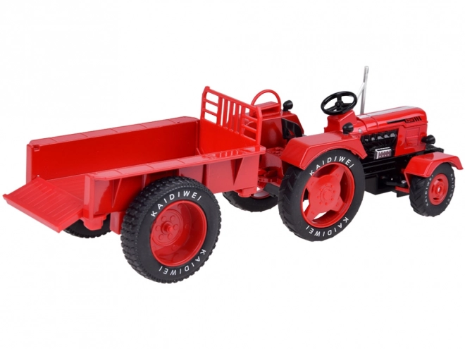 Crveni metalni traktor s gumenim kotačima 1:18