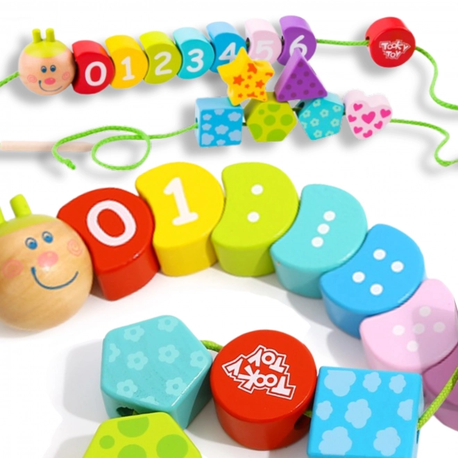 Drvena igračka za oblačenje gusjenice TOOKY TOY