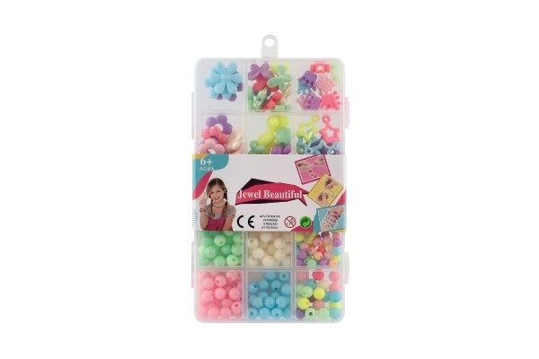 Plastične perle u boji s uzicom u plastičnoj kutiji 10x17x2cm