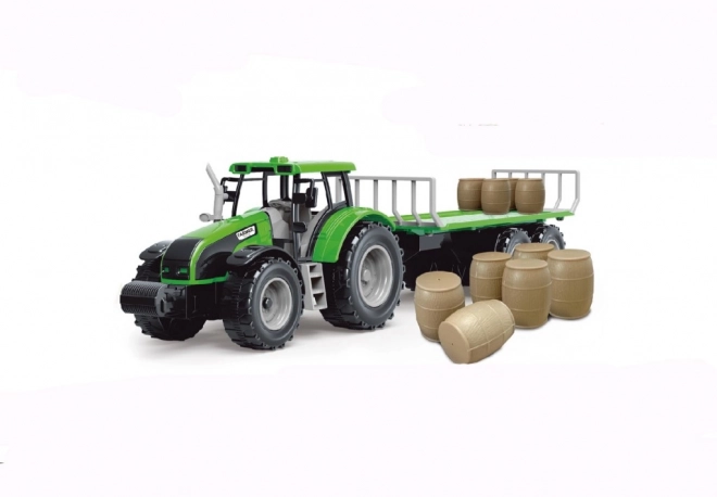Traktor sa zamajcem i prikolicom punom sijena