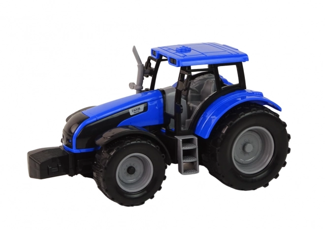 Interaktivni traktor s prikolicom - plavi