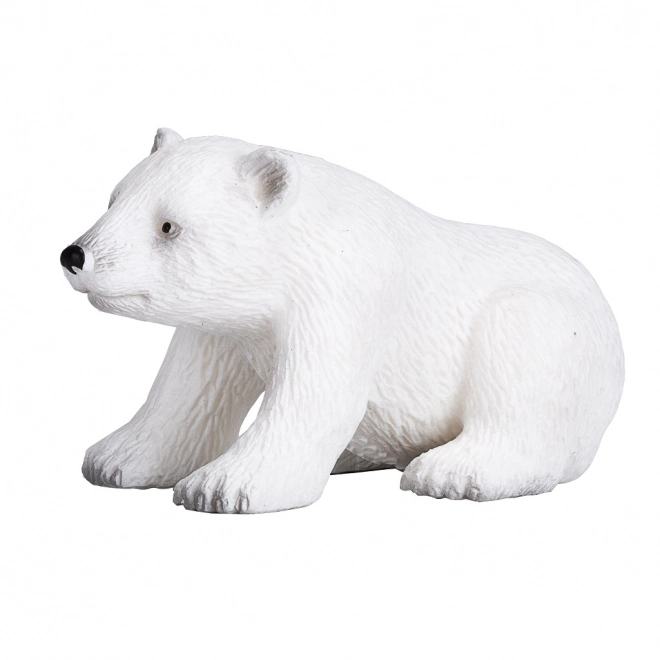 Figurica polarne medvjedice koja sjedi